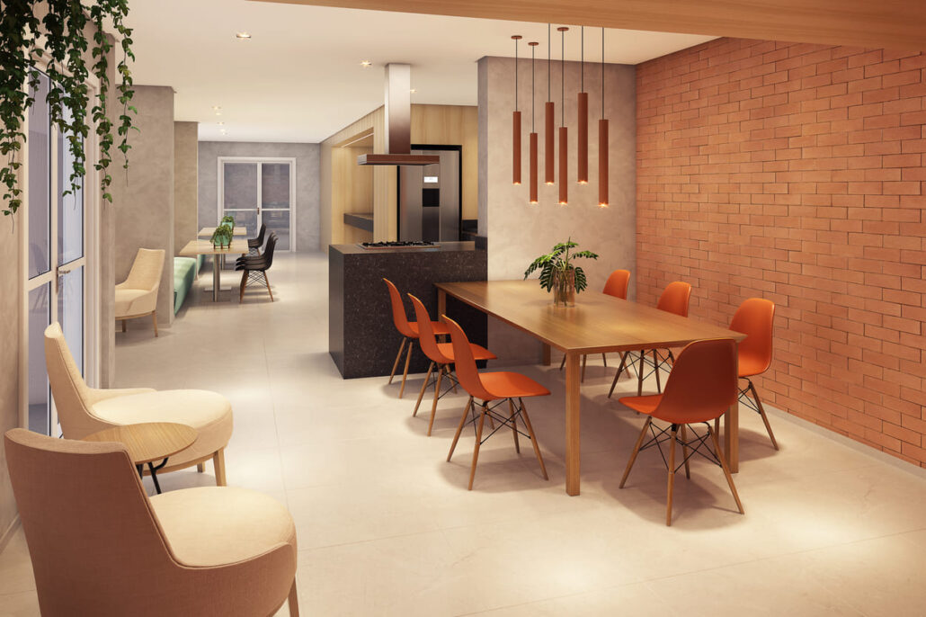 espaço gourmet com mesa grande e cadeiras vermelhas