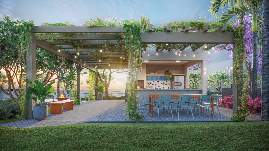 area externa com pergolado e flores de decoração, mesas e cadeiras