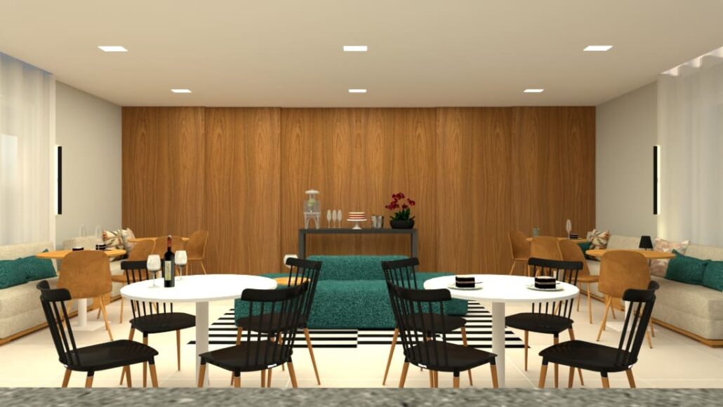 salão de festas com grande sofá e mesas redondas