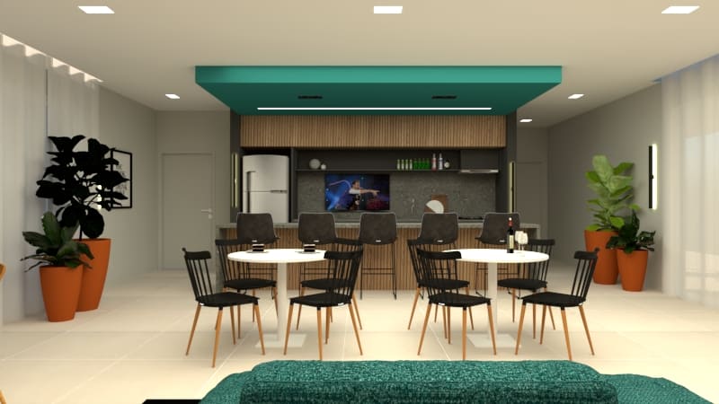 salão de festas com grande sofá e mesas redondas